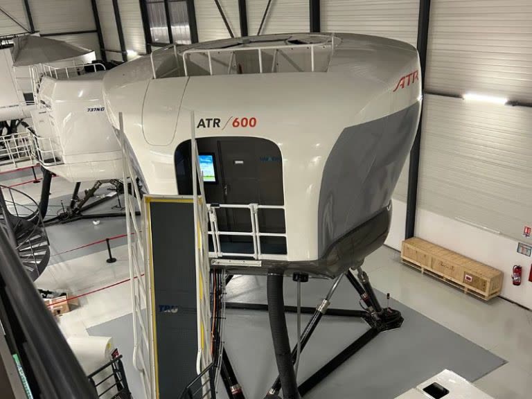 ATR 600 full flight simulator exterior in a training facility hangar