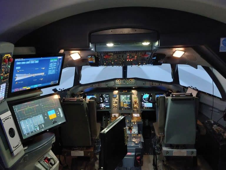 ATR Full Flight Simulator cockpit interior with advanced avionics and flight instruments